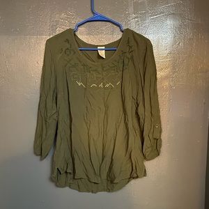 A super cute green blouse.